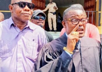 Former Finance Minister Samuel Tweah outside Criminal Court C during his economic sabotage trial in Monrovia.
