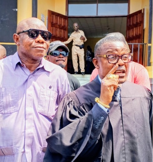 Former Finance Minister Samuel Tweah outside Criminal Court C during his economic sabotage trial in Monrovia.
