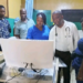 Health officials and medical staff inspect a newly donated colposcope machine at C.B. Dunbar Comprehensive Hospital in Gbarnga, Bong County.