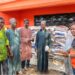 Rep. Moima Briggs Mensah presenting rice donation to Muslim community in Salala during Ramadan.