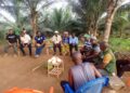 Agriculture Minister Alexander Nuetah engaging farmers during Southeast Liberia agricultural tour.