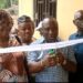 Officials cut the ribbon during the dedication of the refurbished commissioner’s residence in Foequelleh, Bong County District #4.