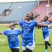 Liberia high school football players celebrating SKD championship