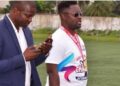 Mustapha Raji and Cassell Kuoh during football event in Liberia