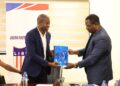 LFA President Mustapha Raji presents a document during the unveiling of the Lone Star Mobilization Committee for Liberia’s 2027 AFCON qualification campaign.