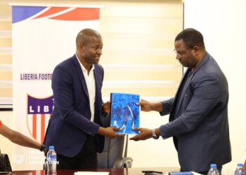 LFA President Mustapha Raji presents a document during the unveiling of the Lone Star Mobilization Committee for Liberia’s 2027 AFCON qualification campaign.