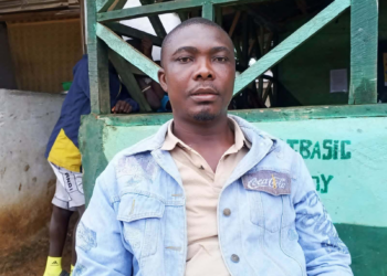 Grand Kru education official addressing teacher absenteeism and payroll reform in Liberia.