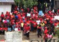 Market women protesting outside the Maryland County administration building in Harper over Liberia Marketing Association fee increases.