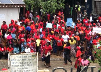 Market women protesting outside the Maryland County administration building in Harper over Liberia Marketing Association fee increases.