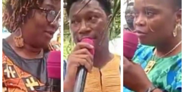 Health officials and community members discuss the maternal waiting home project in Wainsue, Bong County.