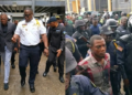 Liberia police escort suspect Francis Nana court appearance Monrovia