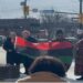 Welland Mayor Frank Campion and community members raise the Pan-African flag during a Black History Month ceremony in Ontario.