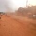 Dust rising from an unfinished road at Lofa Parking commercial area in Bong County, Liberia.