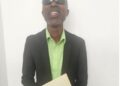 visually impaired man holding an envelope