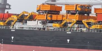 Heavy-duty yellow road construction machines delivered to Liberia to support national road infrastructure development.