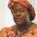 Liberian official speaking at an international meeting, illustrating leadership linked to government accountability and corruption case