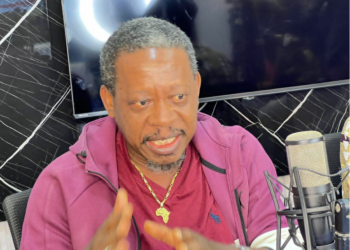 Former Representative Acarous Gray speaks during a radio interview criticizing the Boakai administration