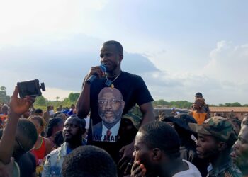 Sekou Kalasco Damaro addresses crowd of supporters during petition rally in Margibi County