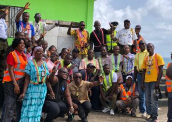 Officials and port workers at Harper Port during inspection visit by Liberia National Port Authority
