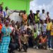 Officials and port workers at Harper Port during inspection visit by Liberia National Port Authority