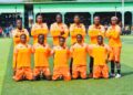 World Girls FC lineup posing before match ahead of Orange Cup final
