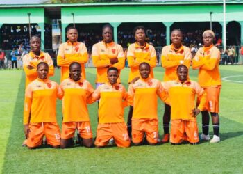 World Girls FC lineup posing before match ahead of Orange Cup final