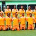 World Girls FC lineup posing before match ahead of Orange Cup final