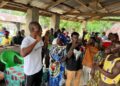 Yekeh Kolubah speaking to community members during Bong County visit