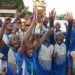 Young football players celebrate victory in Liberia U-15 inter-school league
