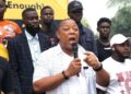 STAND leader addressing supporters during protest over Boakai peace award