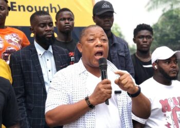 STAND leader addressing supporters during protest over Boakai peace award
