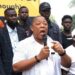 STAND leader addressing supporters during protest over Boakai peace award