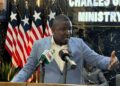 Deputy Information Minister Daniel Sando speaking at press briefing on government reforms in Liberia
