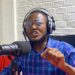 Foday Massaquoi speaking at press conference in Monrovia