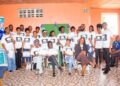 Kutoa Afrika graduates posing with certificates in Paynesville