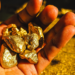 Gold nuggets symbolizing reported discovery under investigation in Nimba County, Liberia