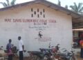 Mae Davis Public Elementary School in Bomi County where students share chairs and sit on floors due to poor conditions