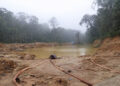 Illegal mining site inside Sapo National Park highlighting environmental damage and enforcement action in Liberia