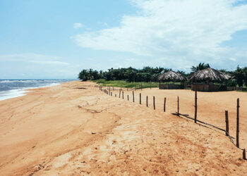 Liberia coastline with sandy beach and Atlantic Ocean illustrating the country’s maritime zone and fisheries potential