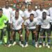 Jubilee FC players pose before a match as the club faces relegation following LFA ruling