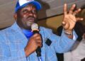 Musa Hassan Bility speaking during public event in Liberia