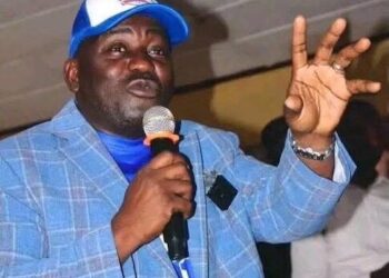 Musa Hassan Bility speaking during public event in Liberia