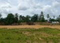 Open football field in Grand Kru County where artificial turf pitch is planned for development