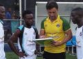Coach Ibrahim Cezayir instructing Bea Mountain players during match