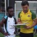Coach Ibrahim Cezayir instructing Bea Mountain players during match