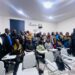 Members of Noble Second Floor and stakeholders at the dedication of a refurbished classroom at the Louis Arthur Grimes School of Law