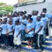Graduates of the Waves for Change and Arise From Ashes surf therapy and youth empowerment program gather in Harper City, Maryland County