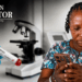 A Liberian woman checks her phone amid public concern over a false Ebola alert circulating on social media.
