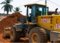 Construction activities and traffic congestion along Liberia’s Roberts International Airport Highway project.