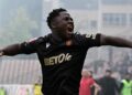 Liberian forward Emmanuel Sieh celebrating after helping Čelik Zenica secure promotion in Bosnia